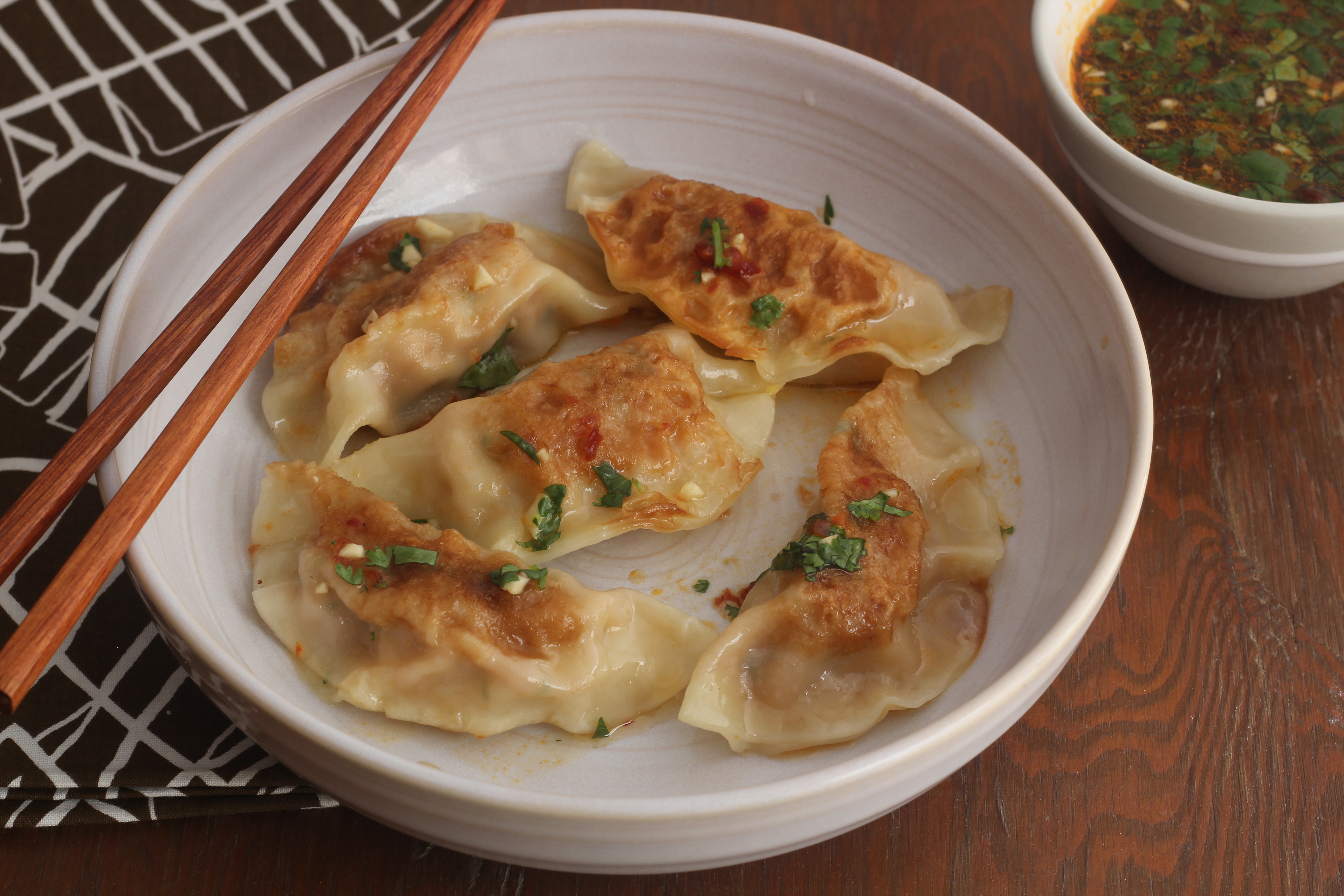 Crawfish Dumpling With A Spicy Orange Dipping Sauce | Emerils.com