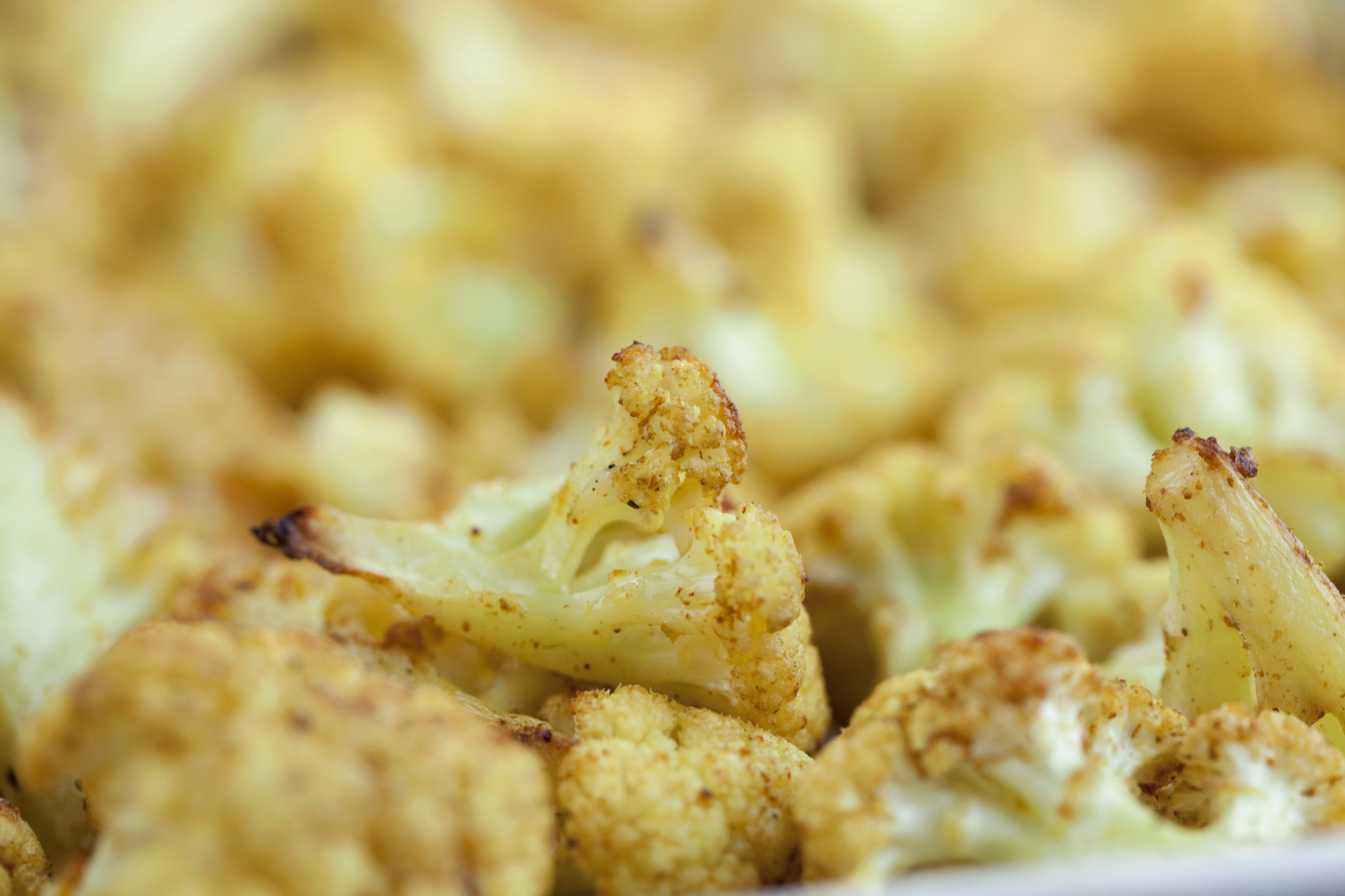 Curry-Scented Roasted Cauliflower | Emerils.com