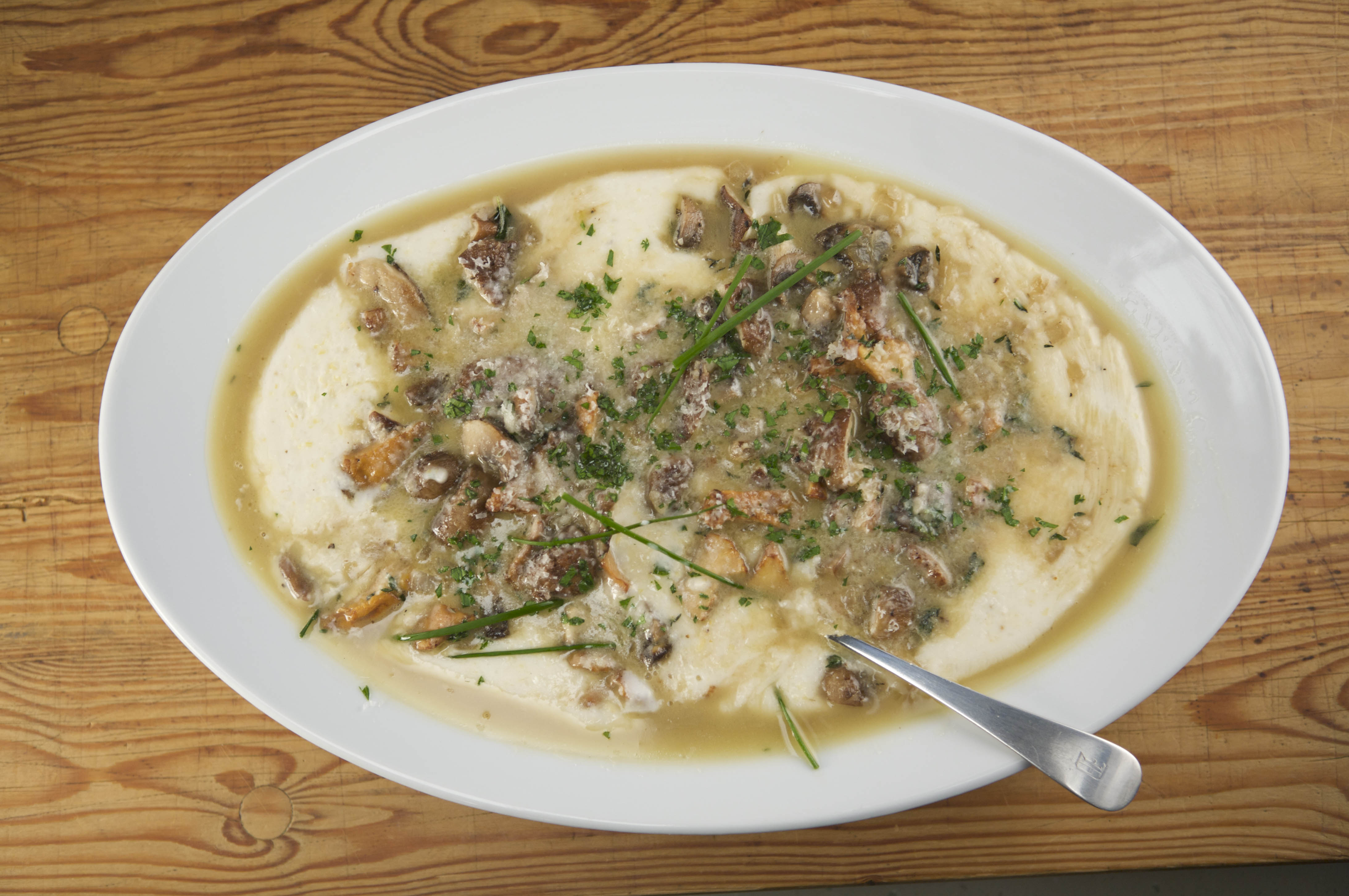Wild Mushroom Ragout Over Stone Ground Grits | Emerils.com