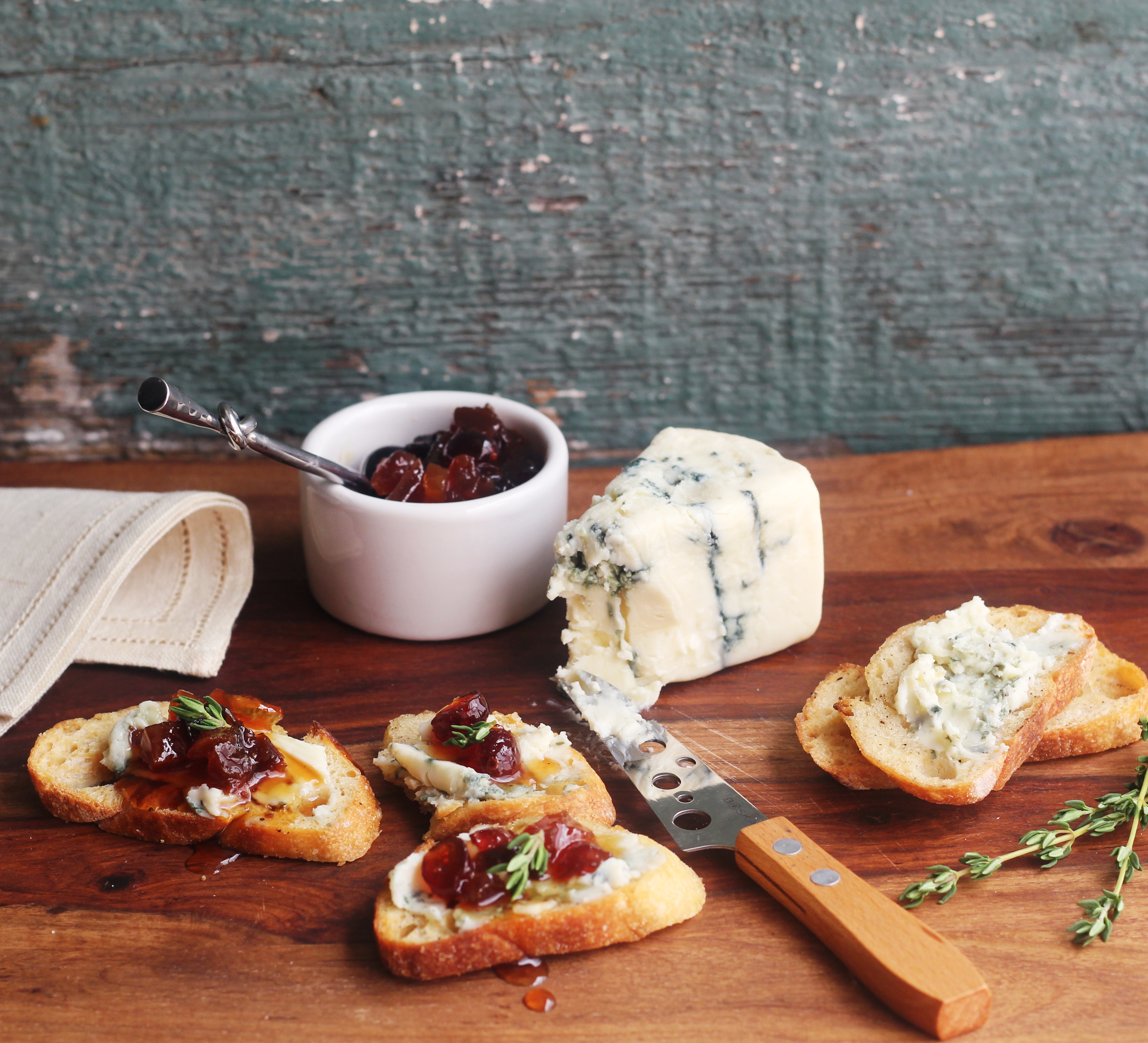 Honey-Thyme Fruit Compote with Blue Cheese Crostini | Emerils.com