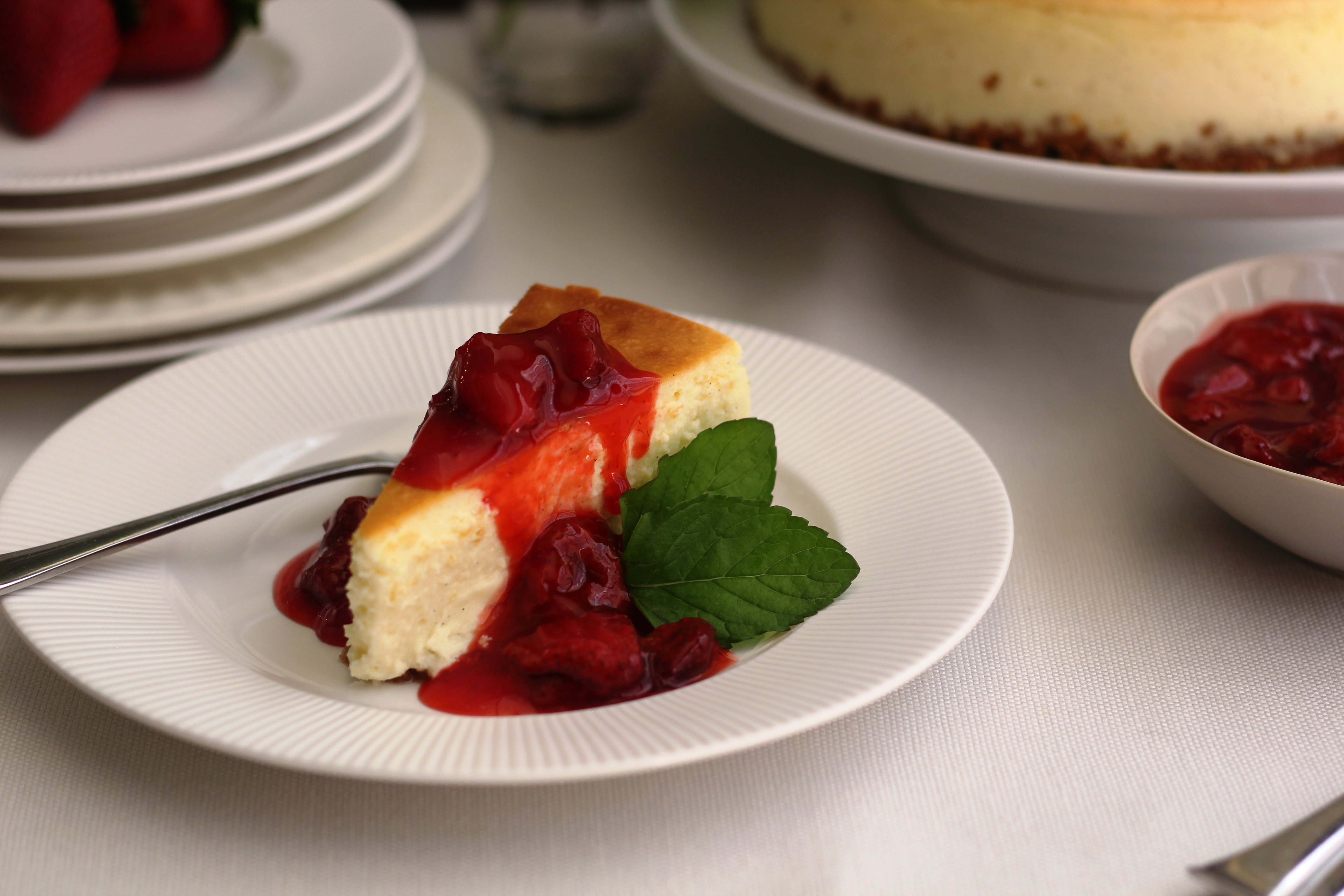 Simply Delicious New York-Style Cheesecake With Strawberry Sauce |  