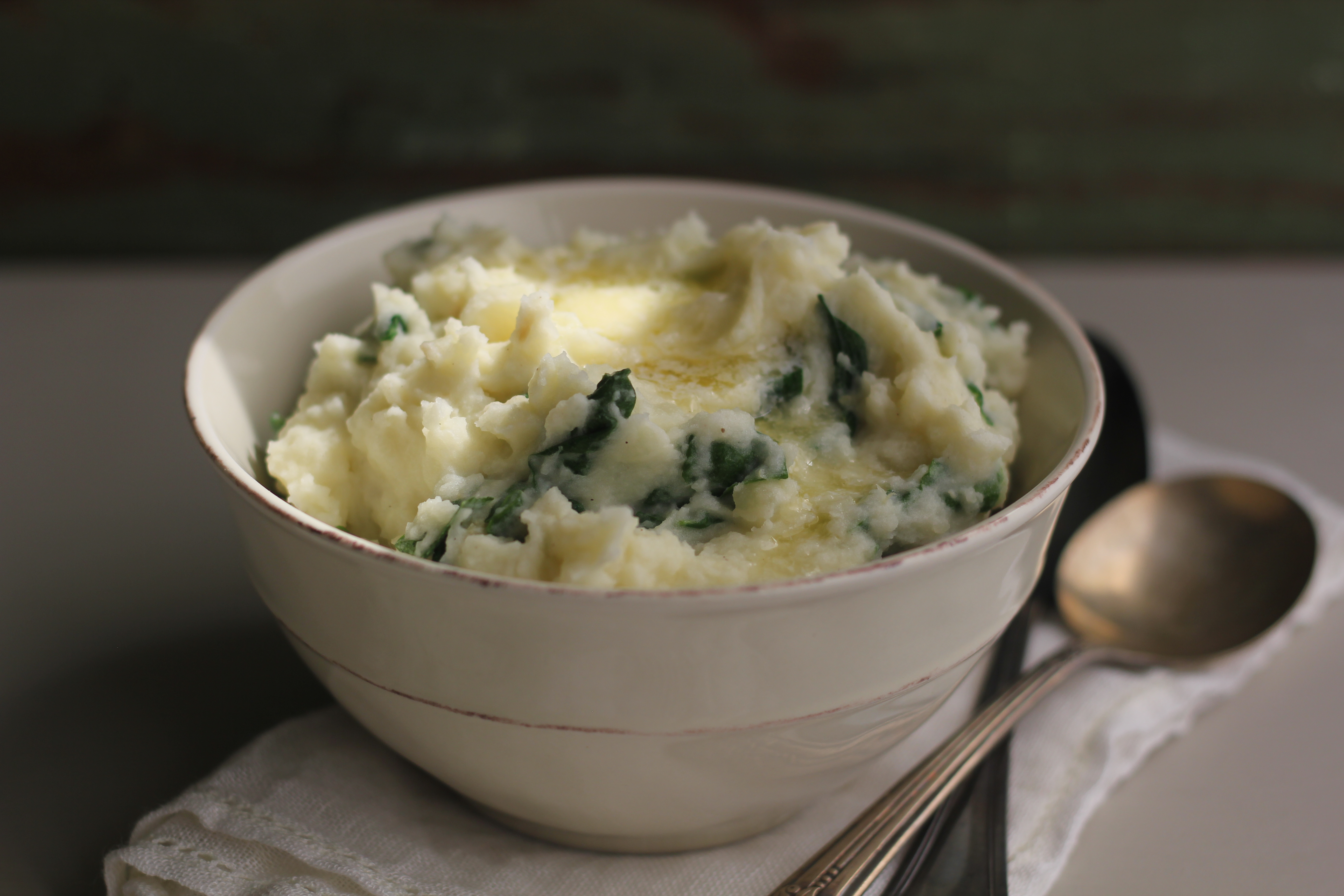 Creamed Potatoes With Spinach And Roasted Garlic | Emerils.com