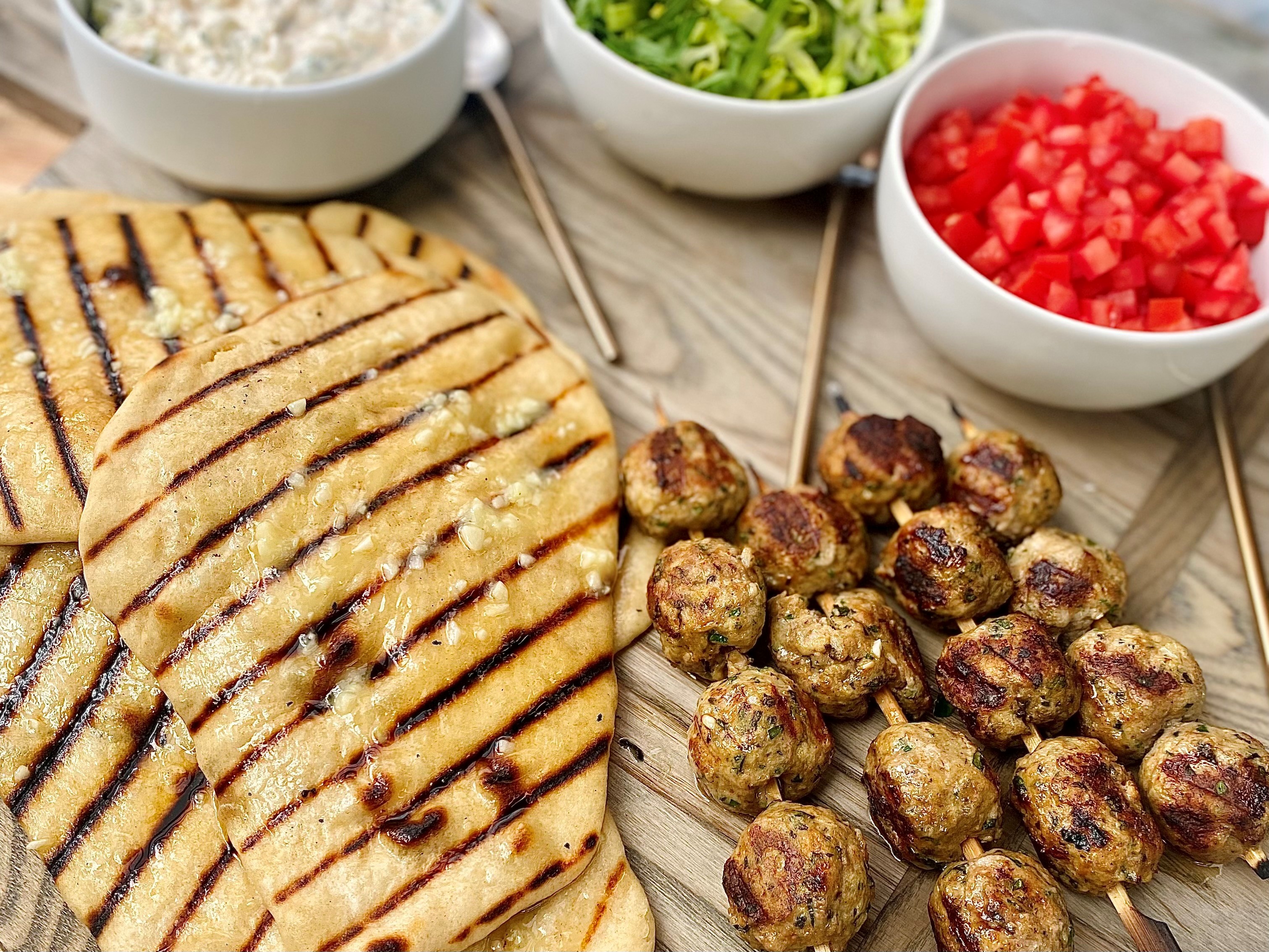 Grilled Lamb Meatballs with Tzatziki Sauce and Grilled Garlic Flatbreads | Emerils.com