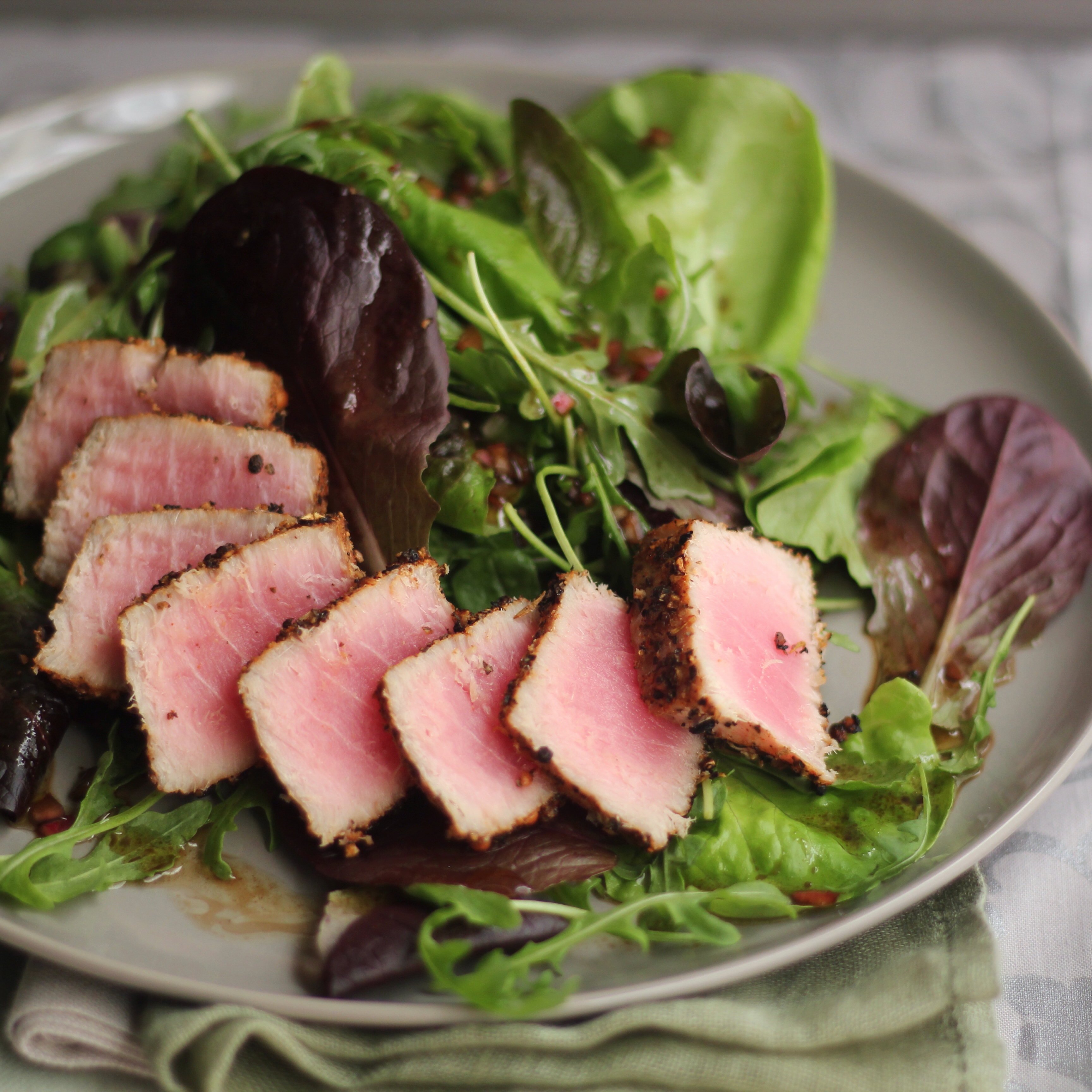 Seared Peppered Tuna With Greens And Vodka Vinaigrette | Emerils.com