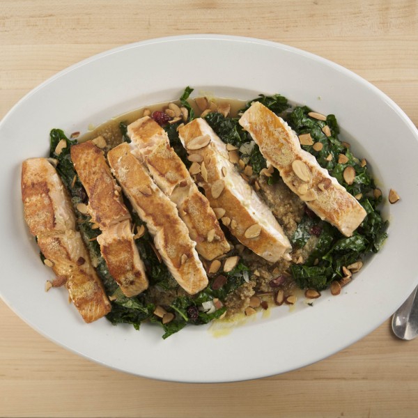 Salmon With Quinoa Mix, Sautéed Kale And Lemon Dijon Vinaigrette