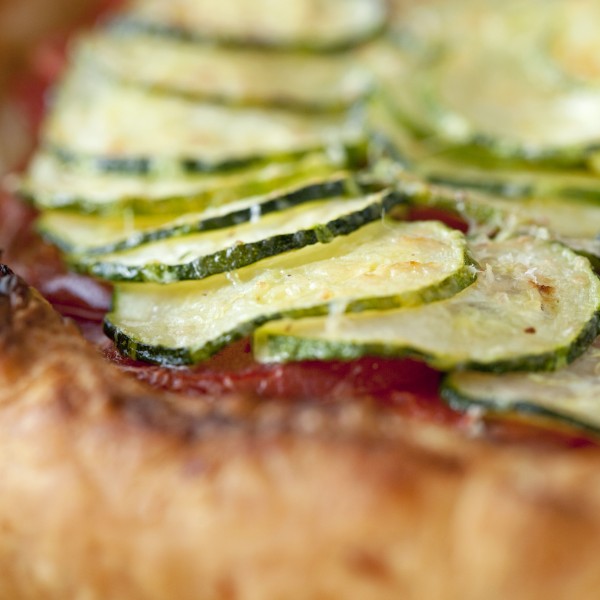 Tomato, Zucchini, And Leek Galette With Roasted Garlic Goat Cheese